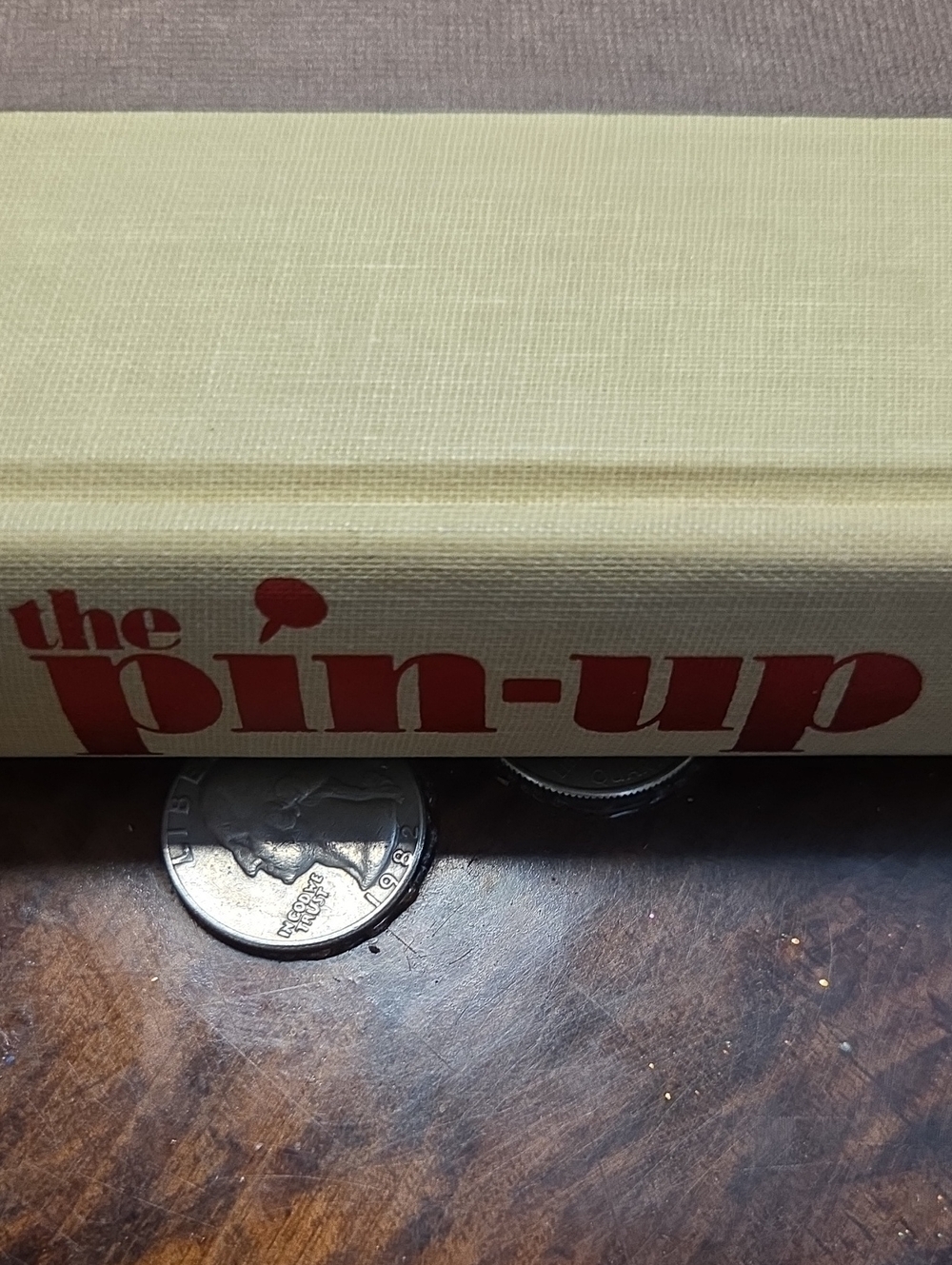 The Pin-Up Hardcover Book – Red Text on Cream Spine